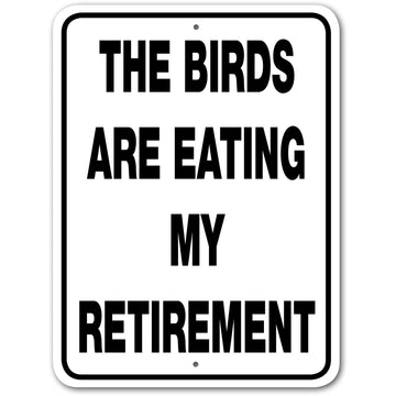 THE BIRDS ARE EATING RETIREMENT signage