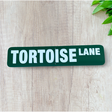 TORTOISE LANE signage